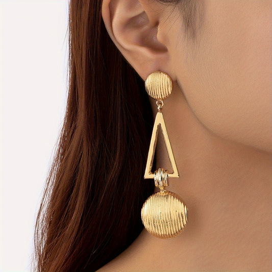 "Exaggerated Metallic Double Circle Earrings with 3D Layered Design"