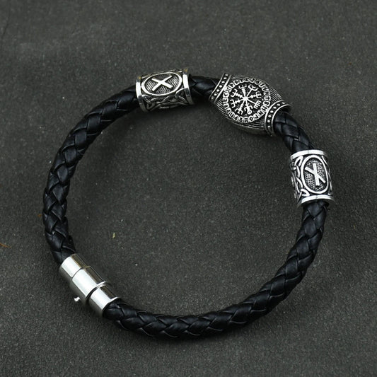 "Viking-inspired jewelry with runes, beads, and charms for men and women, including bracelets and bangles.
