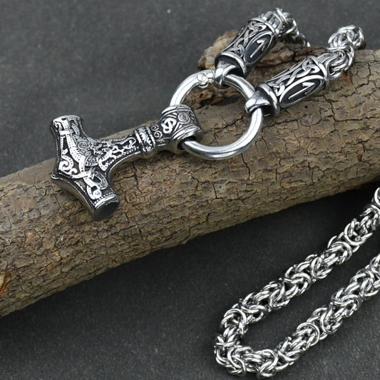 Viking Amulet Necklace – Nordic runes and Thor's hammer pendant on a stainless steel king chain. Bold Viking jewelry.