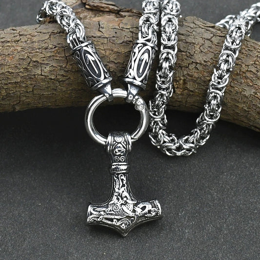 Viking Amulet Necklace – Nordic runes and Thor's hammer pendant on a stainless steel king chain. Bold Viking jewelry.